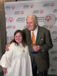 Golf For All with Special Olympian friend after receiving the 2024 Bob Beach Award.